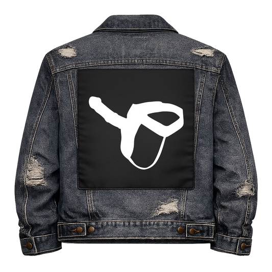 Black fabric back patch sew onto a denim jacket with the design "Strap On"