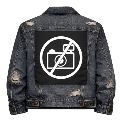 Black fabric back patch sew onto a denim jacket with the design "No Photos"