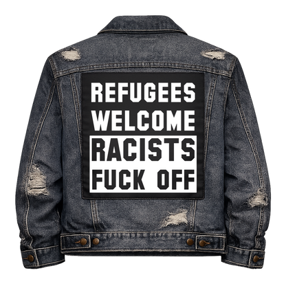 Black fabric back patch sew onto a denim jacket with the design "Racists Fuck Off"