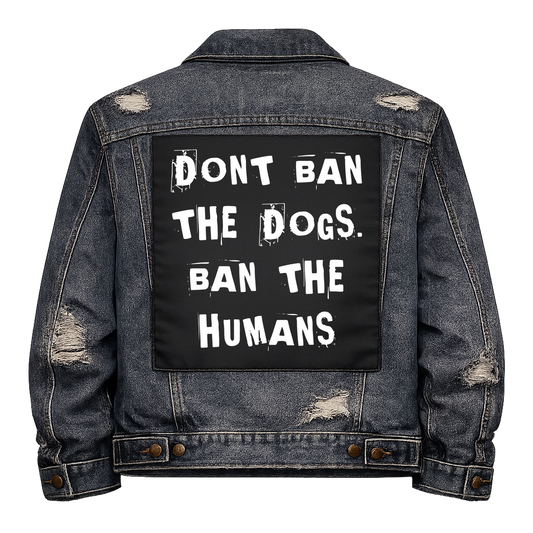 Black fabric back patch sew onto a denim jacket with the design "Don't Ban the Dogs"