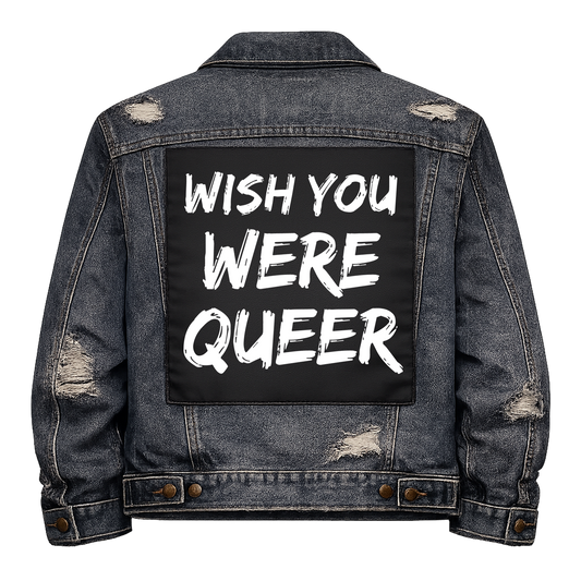 Black fabric back patch sew onto a denim jacket with the design "Wish You Were Queer"