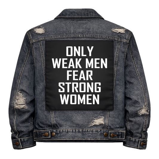 Black fabric back patch sew onto a denim jacket with the design "Weak Men Fear Strong Women"