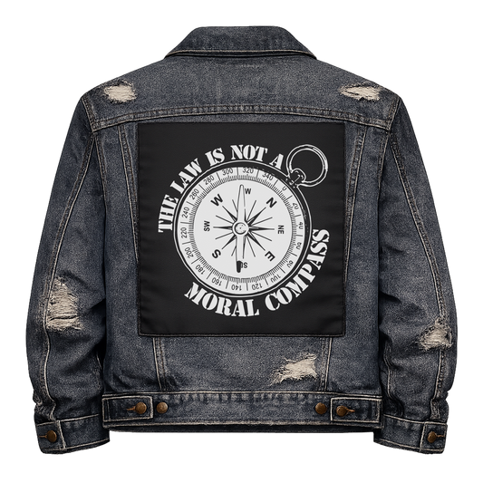 Black fabric back patch sew onto a denim jacket with the design "Law is not a Moral Compass"