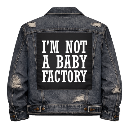 Black fabric back patch sew onto a denim jacket with the design "Not a Baby Factory"