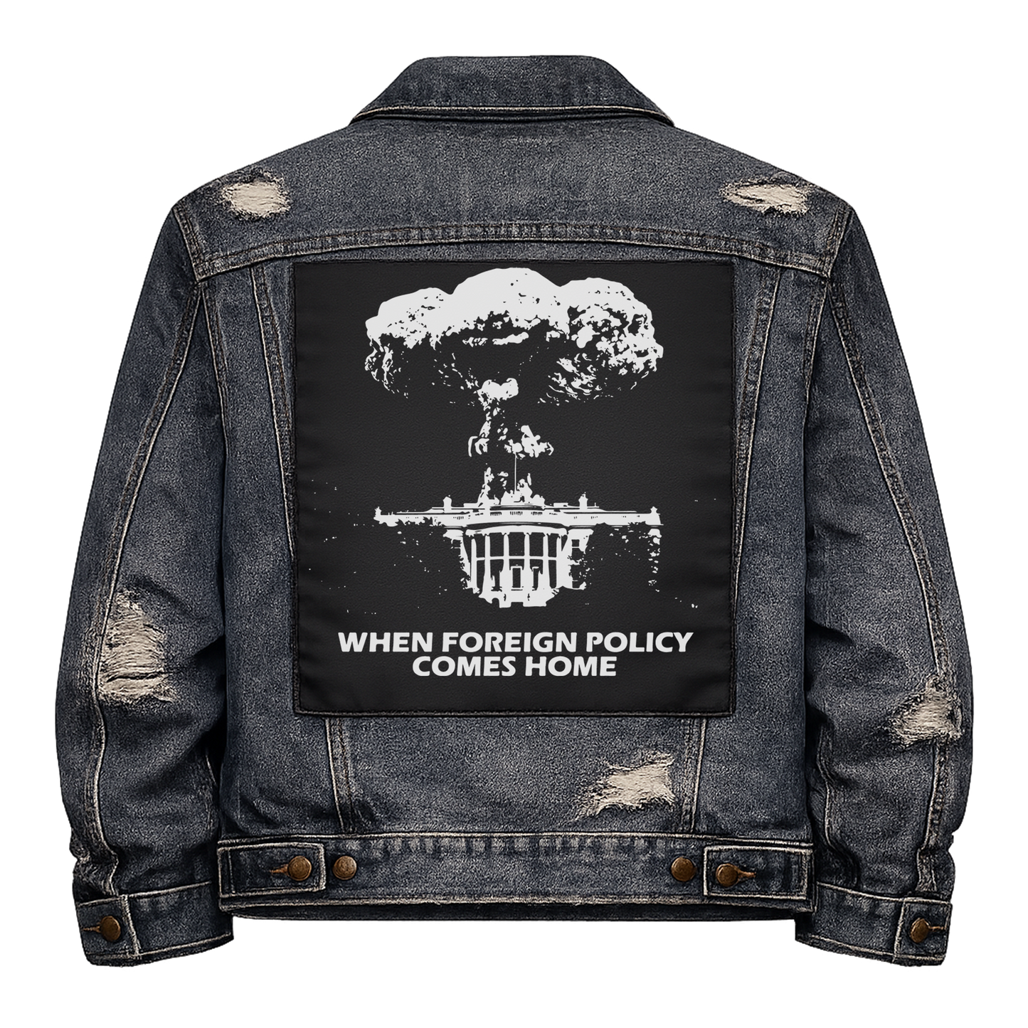 Black fabric back patch sew onto a denim jacket with the design "When Foreign Policy Comes Home"