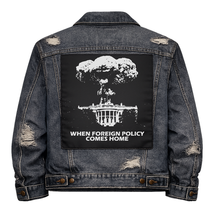 Black fabric back patch sew onto a denim jacket with the design "When Foreign Policy Comes Home"