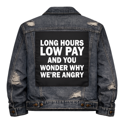 Black fabric back patch sew onto a denim jacket with the design "Long Hours, Low Pay"