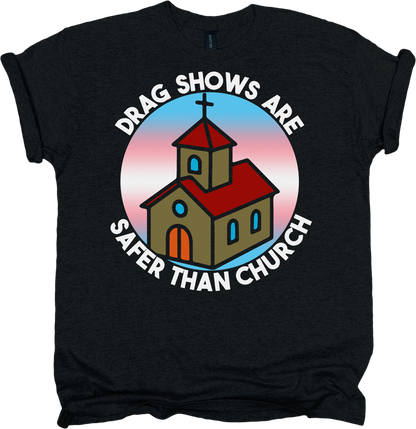 Black t-shirt with a graphic of a church and text 'Drag shows are safer than church'.
