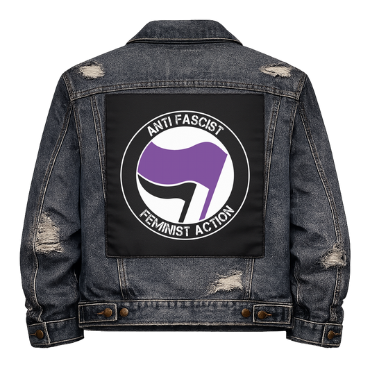 Anti Fascist Feminist Action Full Colour Back Patch shown on the back of a distressed denim jacket: antifa-style roundel with purple and black flags, reading "ANTI FASCIST FEMINIST ACTION"