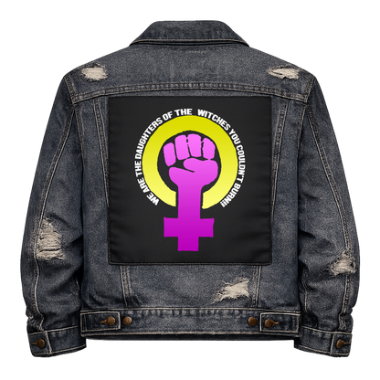 Daughters of Witches Full Colour Back Patch shown on the back of a distressed denim jacket: purple raised fist in a Venus symbol inside a yellow ring, with the slogan curved around it, reading "WE ARE THE DAUGHTERS OF THE WITCHES YOU COULDN'T BURN!"