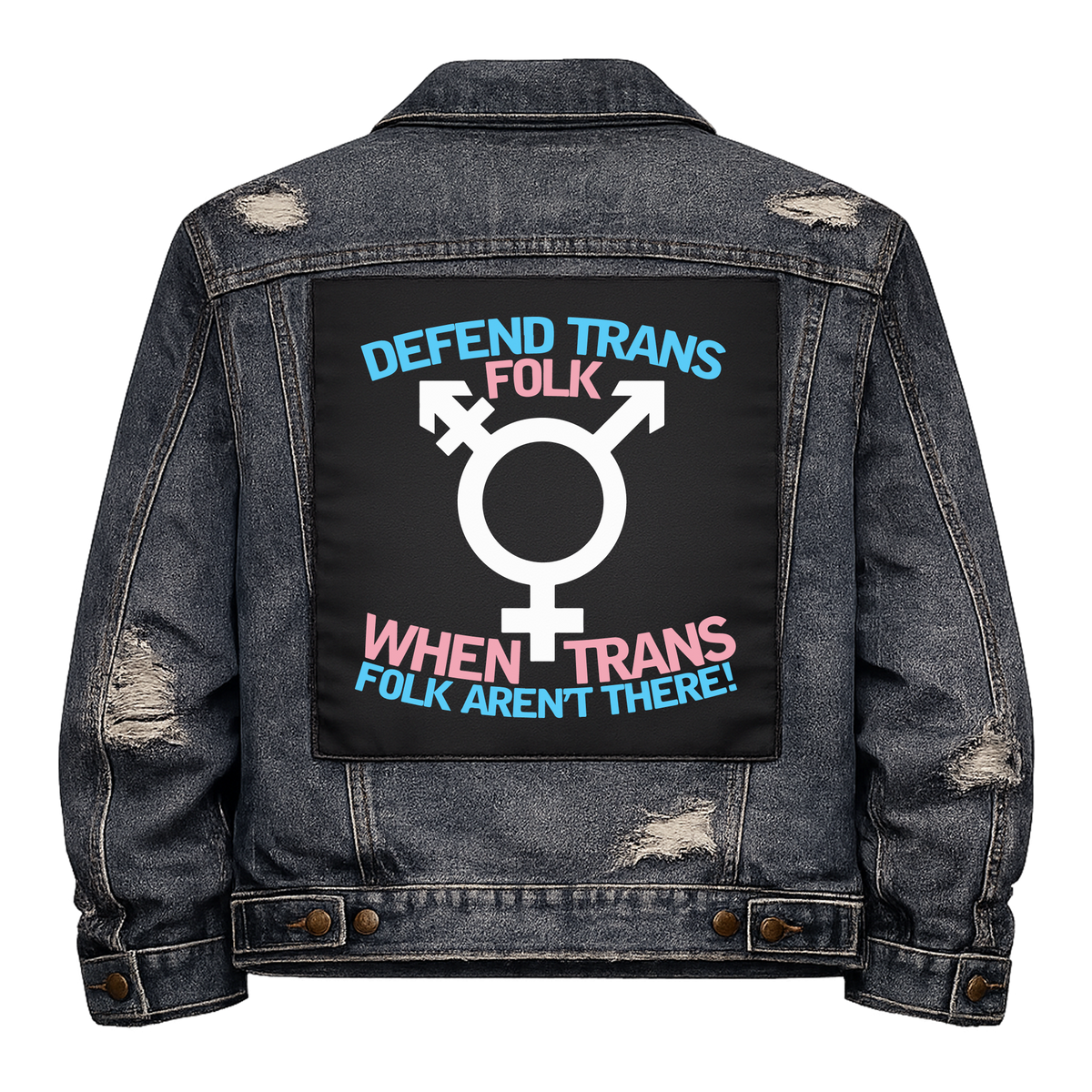 Defend Trans Folk Full Colour Back Patch shown on the back of a distressed denim jacket: trans symbol between lines of trans flag coloured lettering, reading "DEFEND TRANS FOLK WHEN TRANS FOLK AREN'T THERE!"