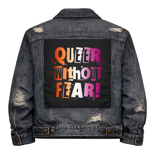 Lesbian Queer Without Fear Full Colour Back Patch shown on the back of a distressed denim jacket: ransom-note letters in lesbian flag orange, white and pink, reading "QUEER WITHOUT FEAR!"
