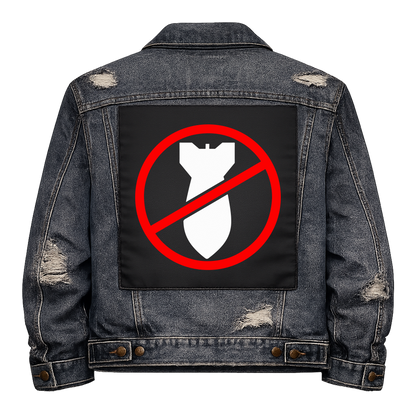 No Bombs Full Colour Back Patch shown on the back of a distressed denim jacket: white bomb inside a red no symbol
