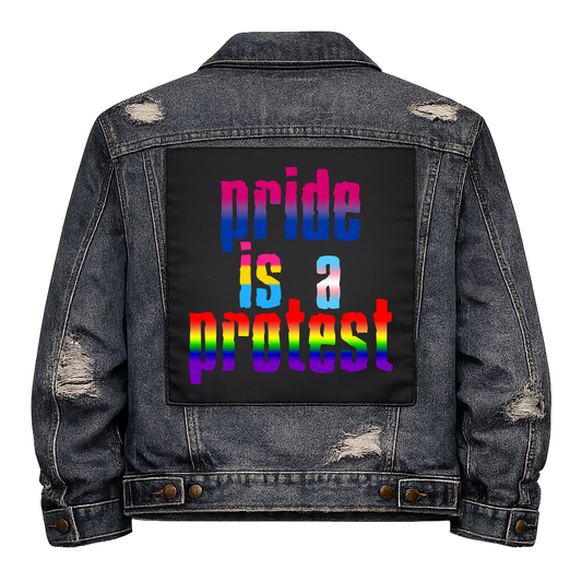 Pride is a Protest Full Colour Back Patch shown on the back of a distressed denim jacket: lowercase lettering in rainbow gradient, reading "PRIDE IS A PROTEST"
