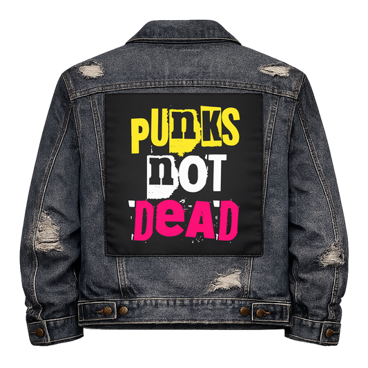 Punks Not Dead Full Colour Back Patch shown on the back of a distressed denim jacket: yellow, white and pink ransom-note letters, reading "PUNKS NOT DEAD"