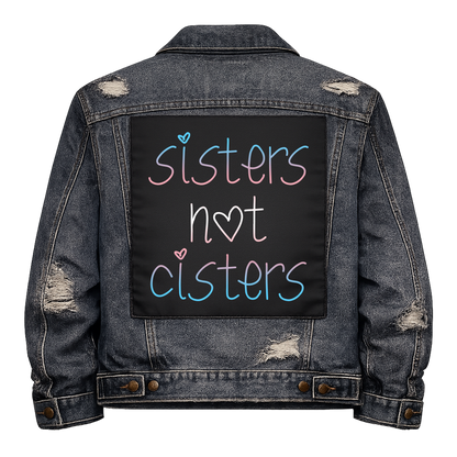 Sisters Not Cisters Full Colour Back Patch shown on the back of a distressed denim jacket: handwritten lettering in trans flag pink and blue, reading "SISTERS NOT CISTERS"