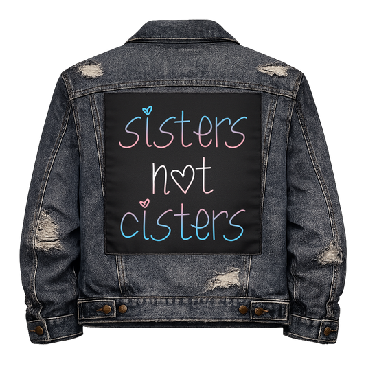 Sisters Not Cisters Full Colour Back Patch shown on the back of a distressed denim jacket: handwritten lettering in trans flag pink and blue, reading "SISTERS NOT CISTERS"
