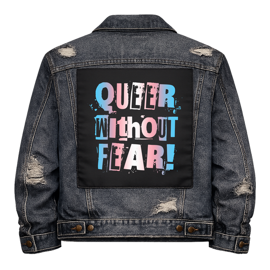 Trans Queer Without Fear Full Colour Back Patch shown on the back of a distressed denim jacket: ransom-note letters in trans flag colours, reading "QUEER WITHOUT FEAR!"